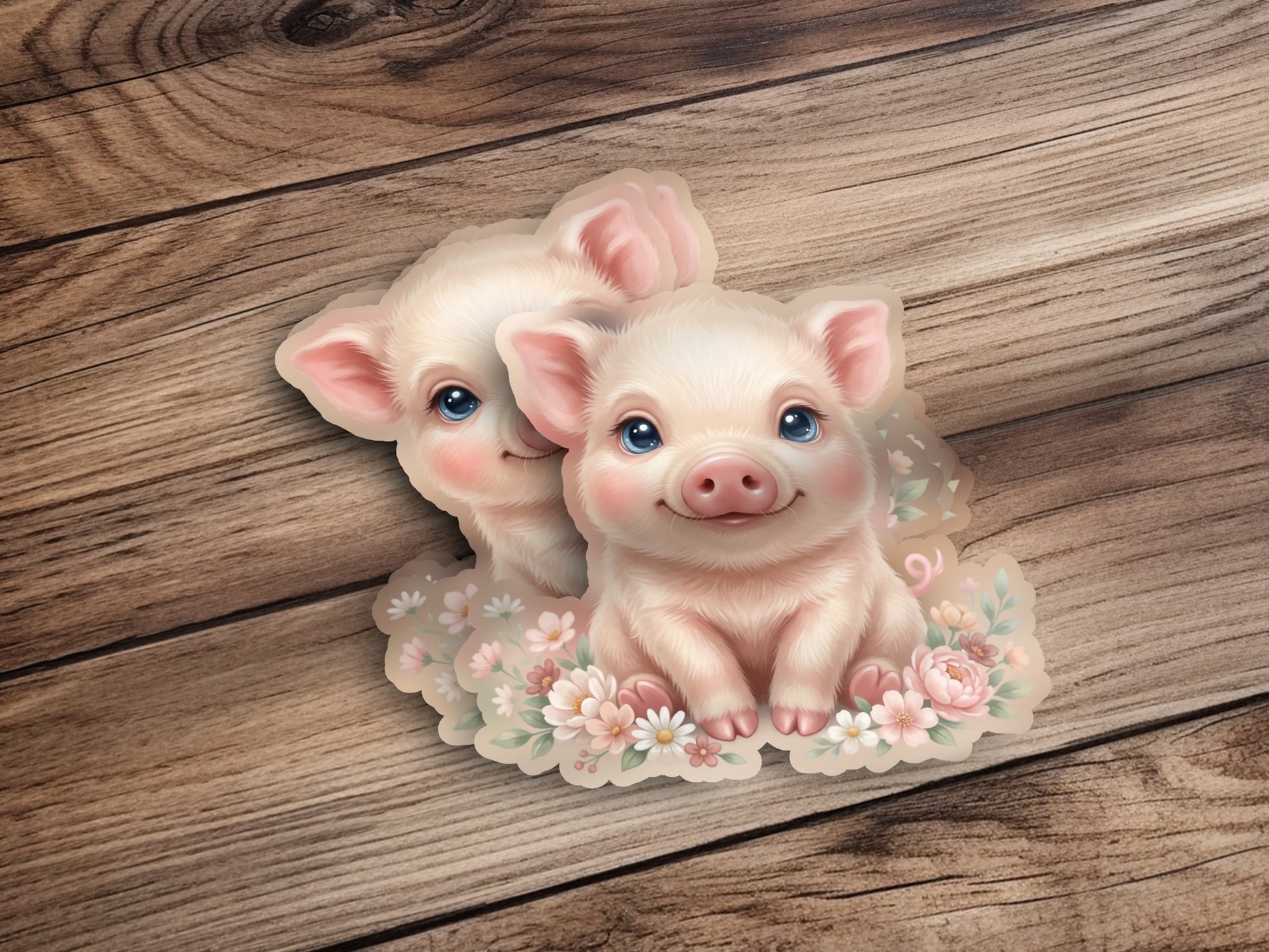 Two cute, stylized piglets sit among flowers on a wooden background.