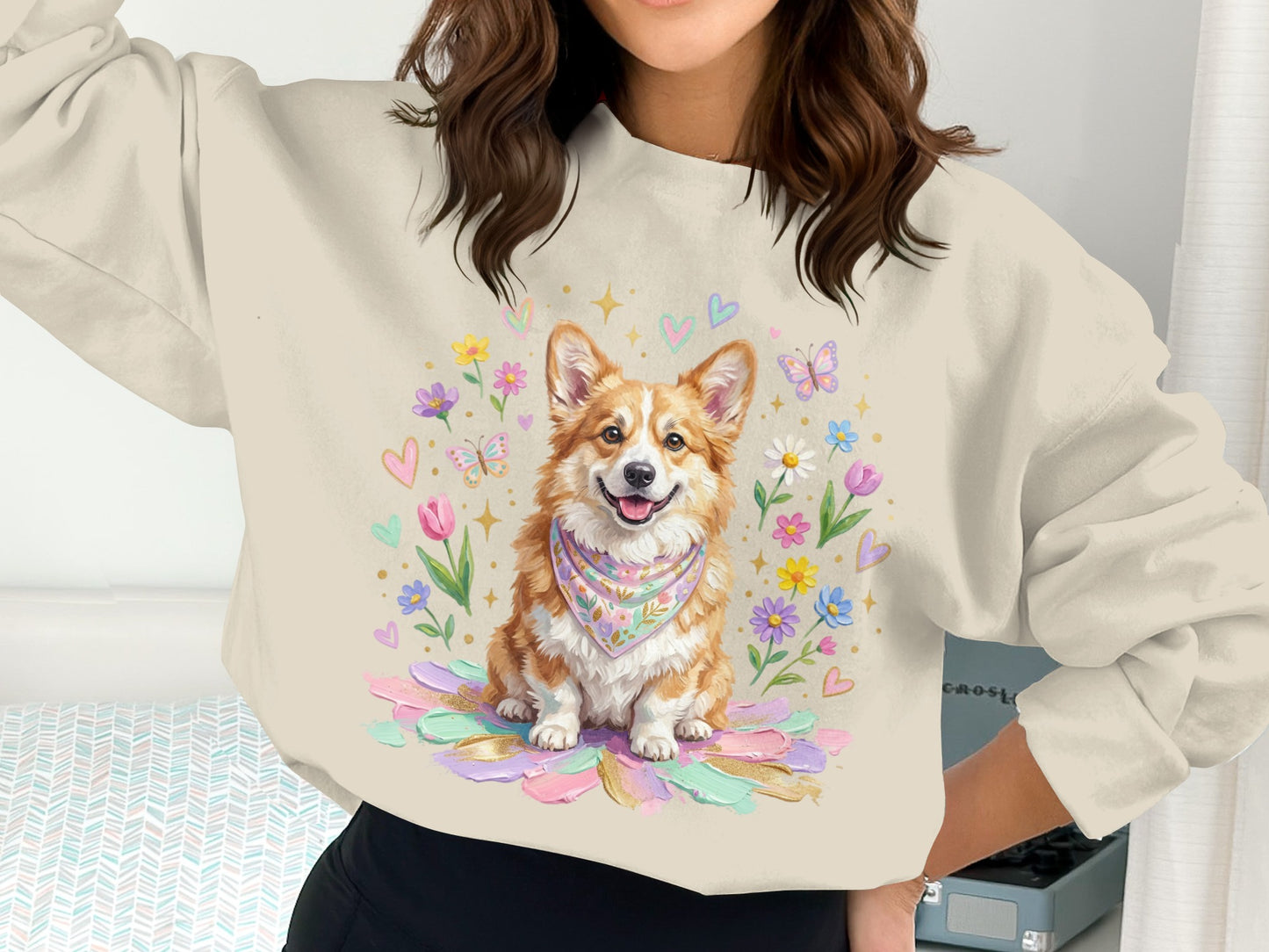 Corgi wearing a bandana on a pastel flower bed.
