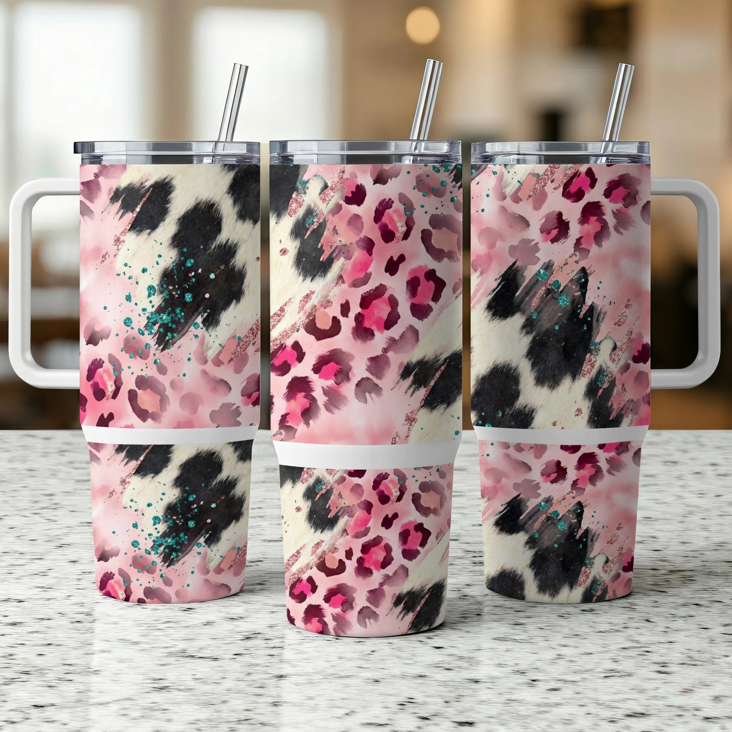 Three tumblers with pink leopard print, black and white cow print, and teal glitter accents.