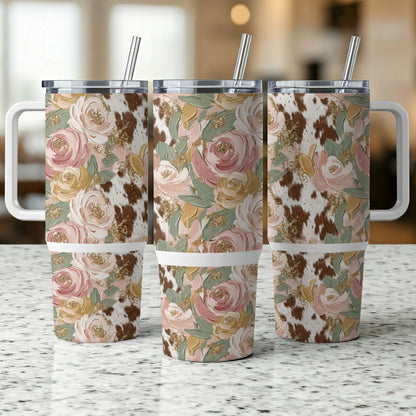 Three tumblers with floral and cowhide print, set against a blurred background.
