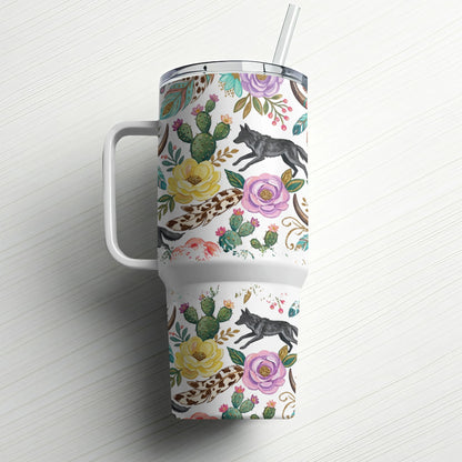 White tumbler with western floral and wolf pattern, featuring a handle and straw.