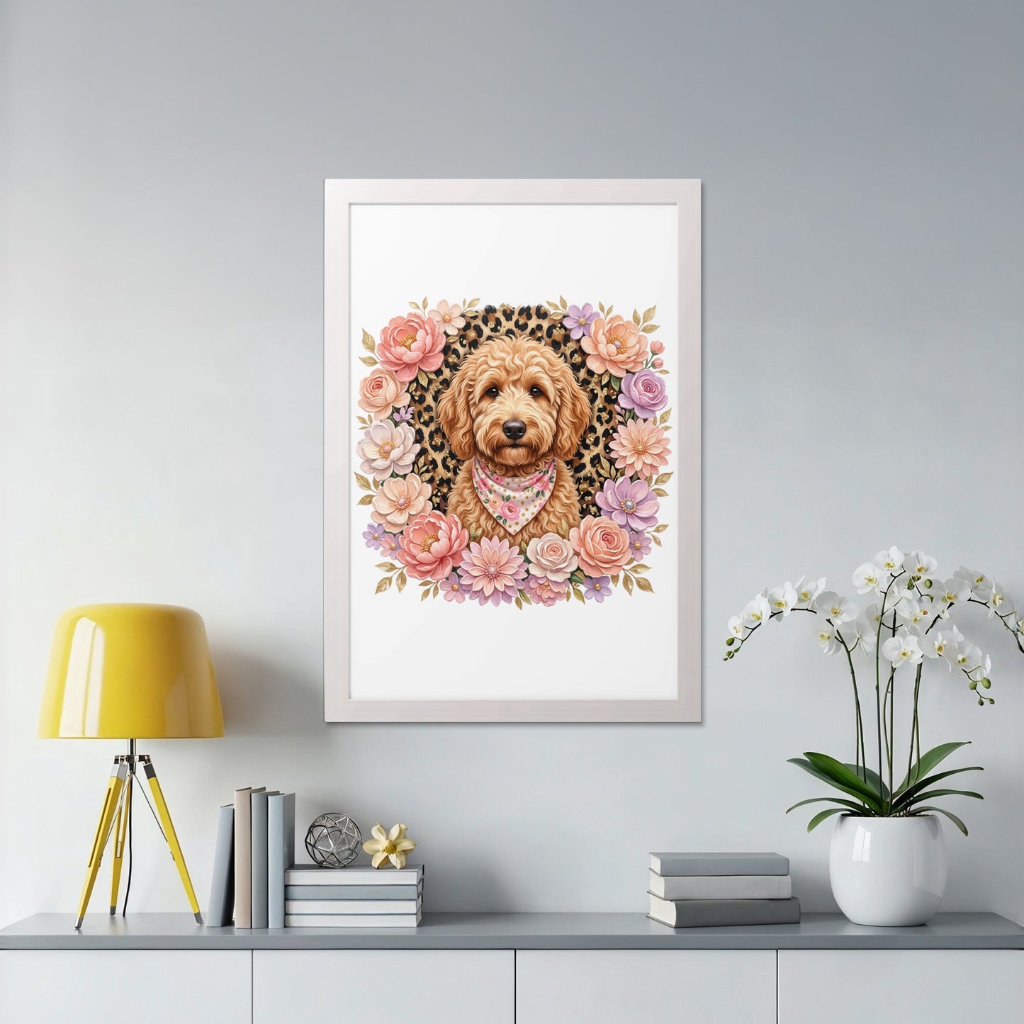 Framed artwork of a doodle dog wearing a bandana surrounded by flowers.