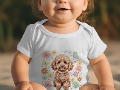 Baby in white onesie with cartoon poodle and flowers.