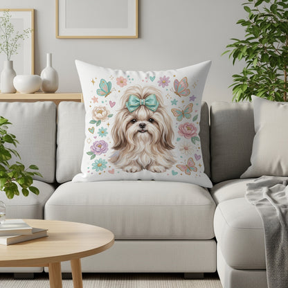 Shih Tzu dog with a blue bow on a floral patterned pillow.