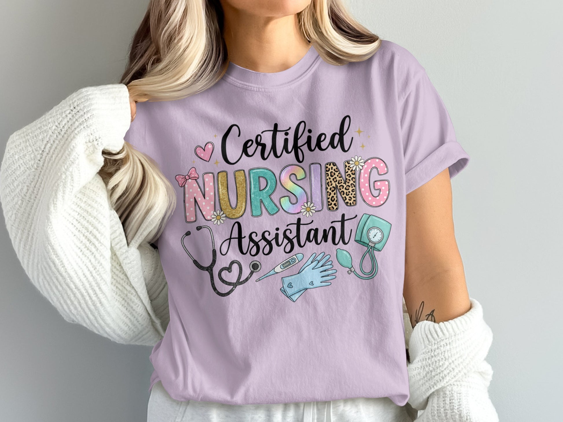 Lavender t-shirt with "Certified Nursing Assistant" text and medical icons.