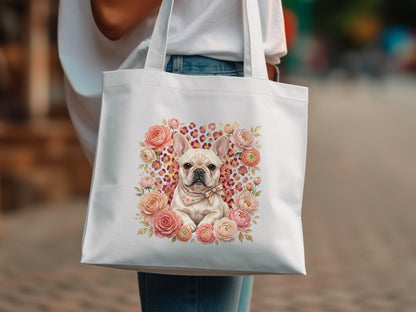 White canvas tote bag with French bulldog illustration surrounded by flowers.