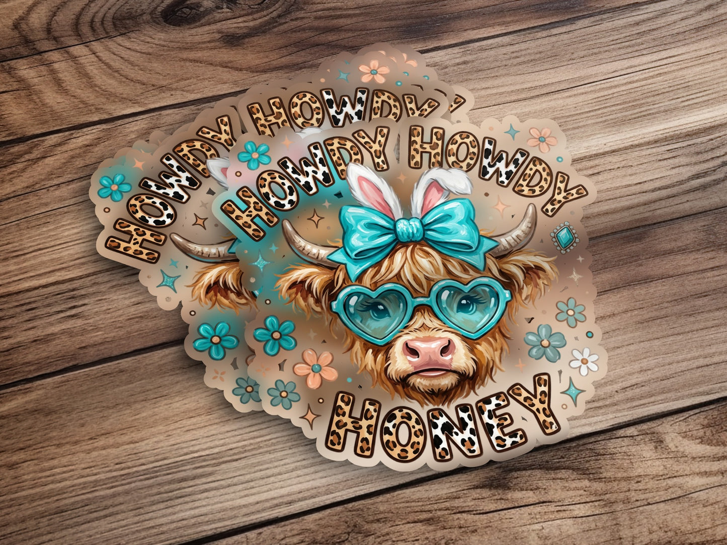 Cow wearing heart sunglasses and bunny ears, "Howdy Honey" text.