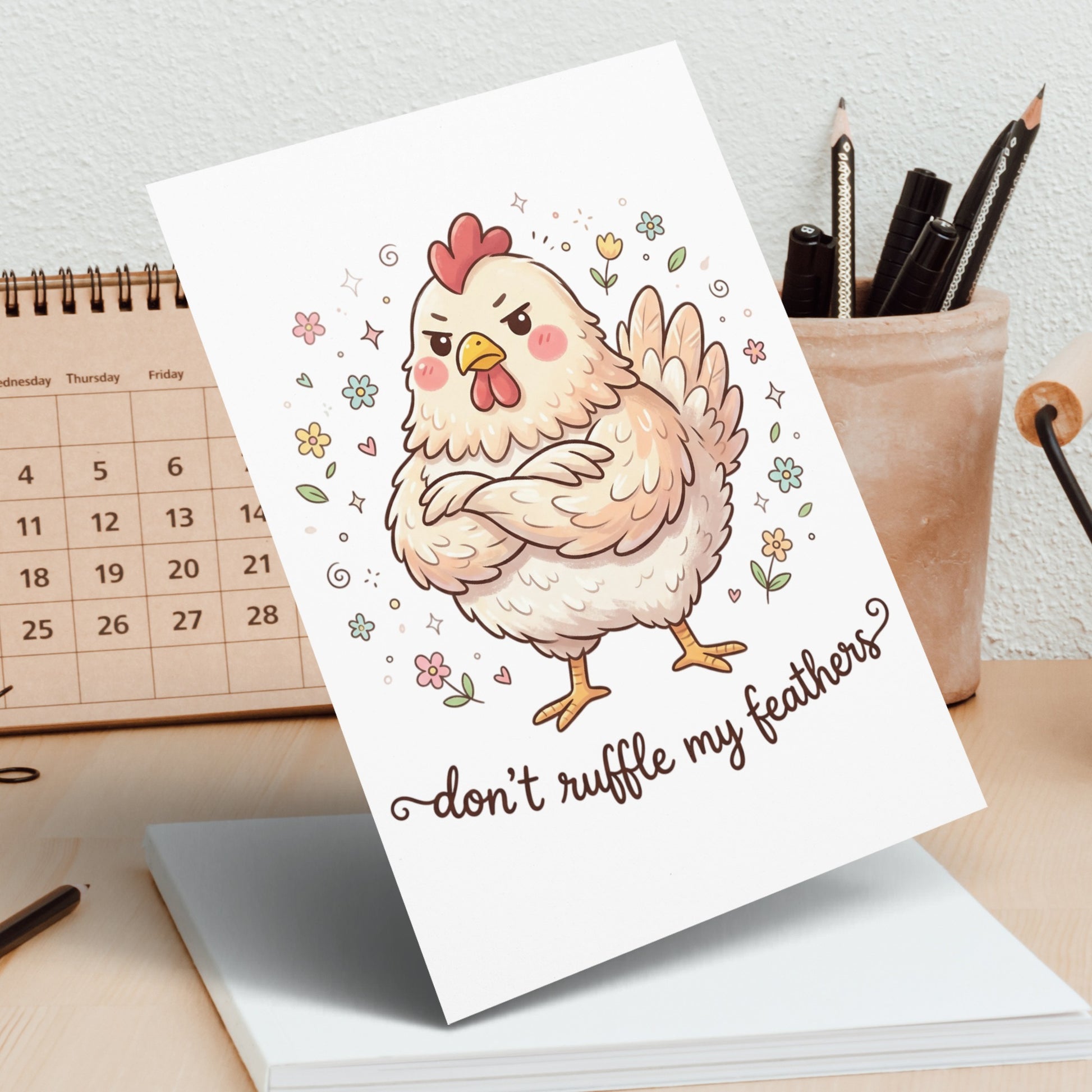 Card with a grumpy cartoon chicken and the text "don't ruffle my feathers."