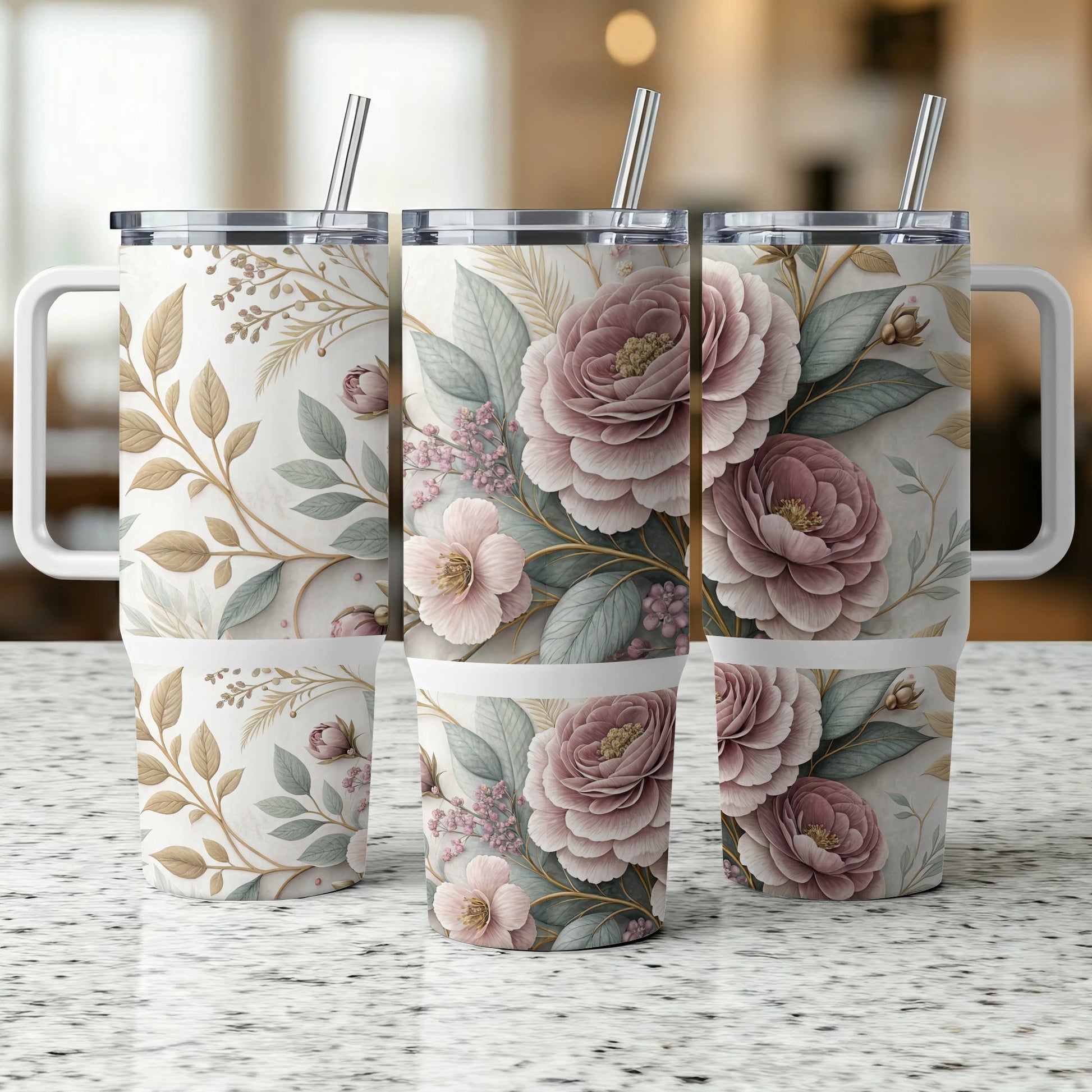 Three tumblers with floral and leaf patterns, one straw each.