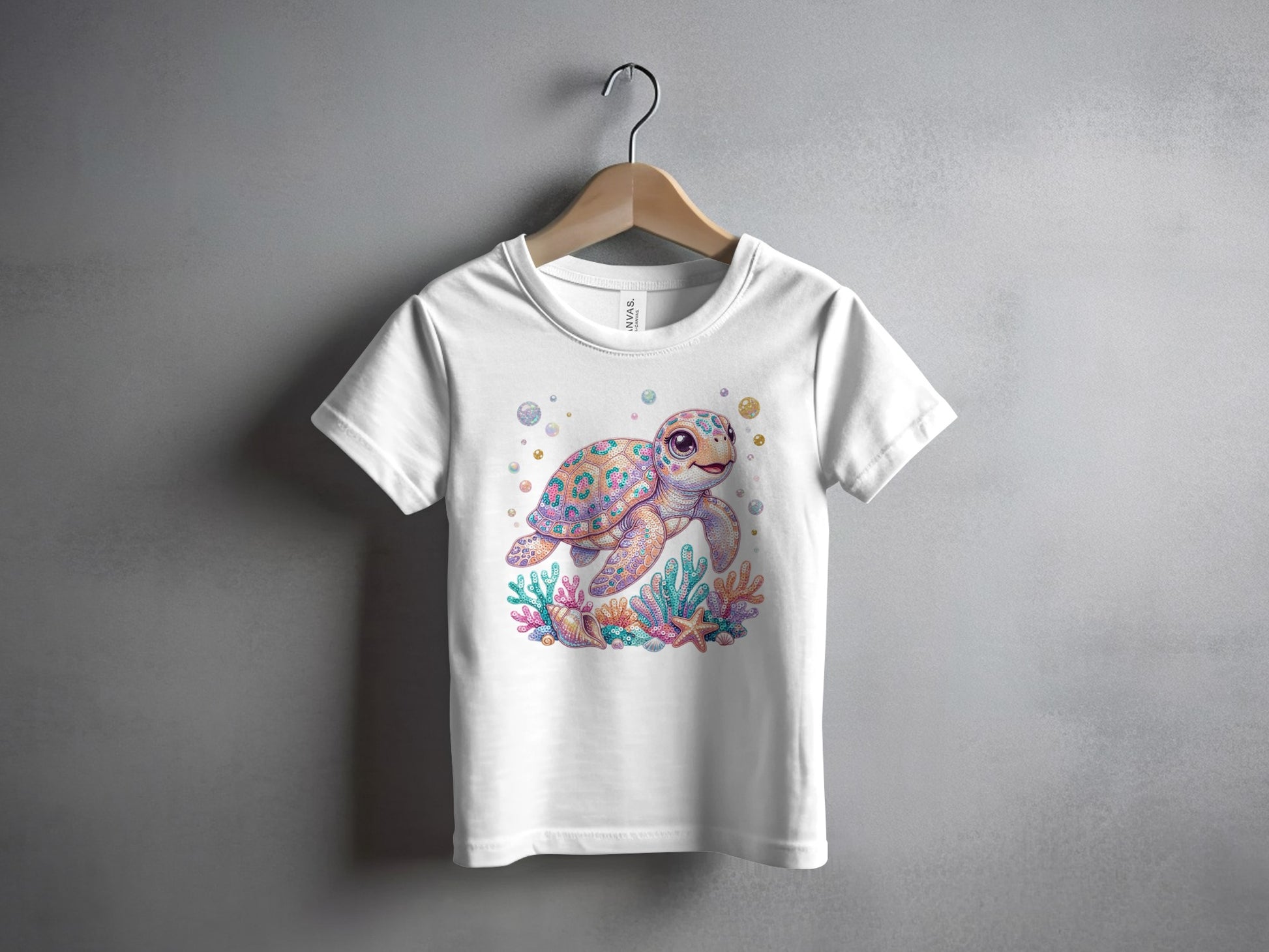 White t-shirt with a colorful cartoon sea turtle, coral, and bubbles design.