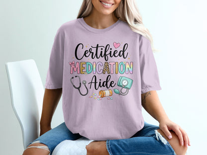 T-shirt with "Certified Medication Aide" text, stethoscope, and medical symbols.