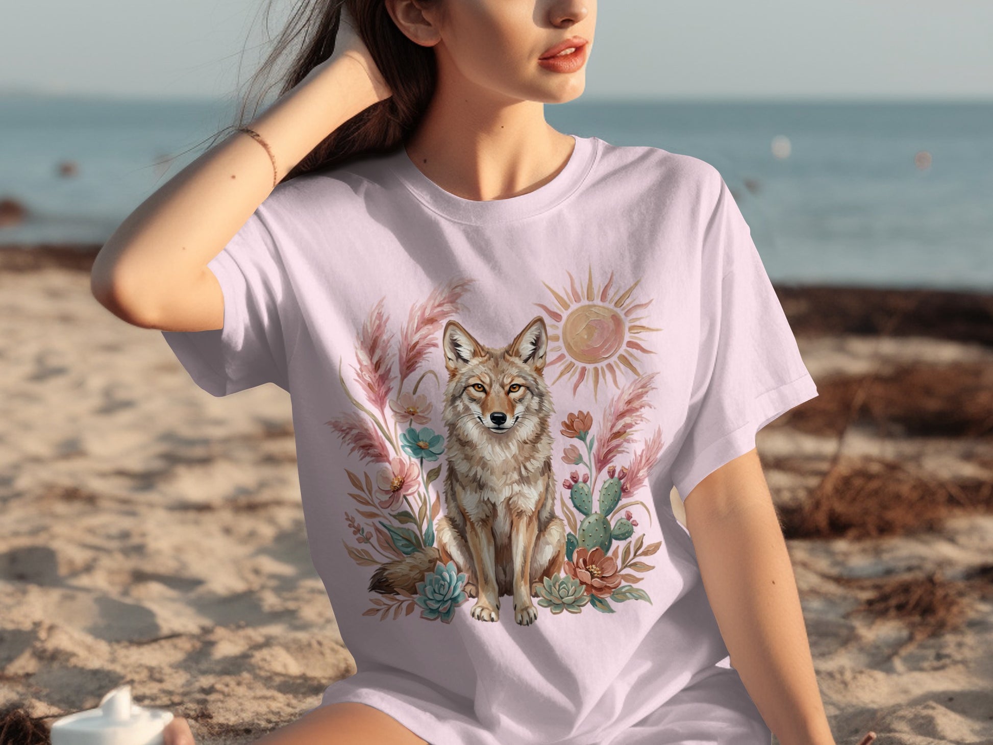 T-shirt with coyote, cactus, and sun graphic.