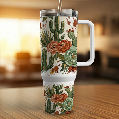 Floral and cactus pattern on a tumbler with a handle and straw.