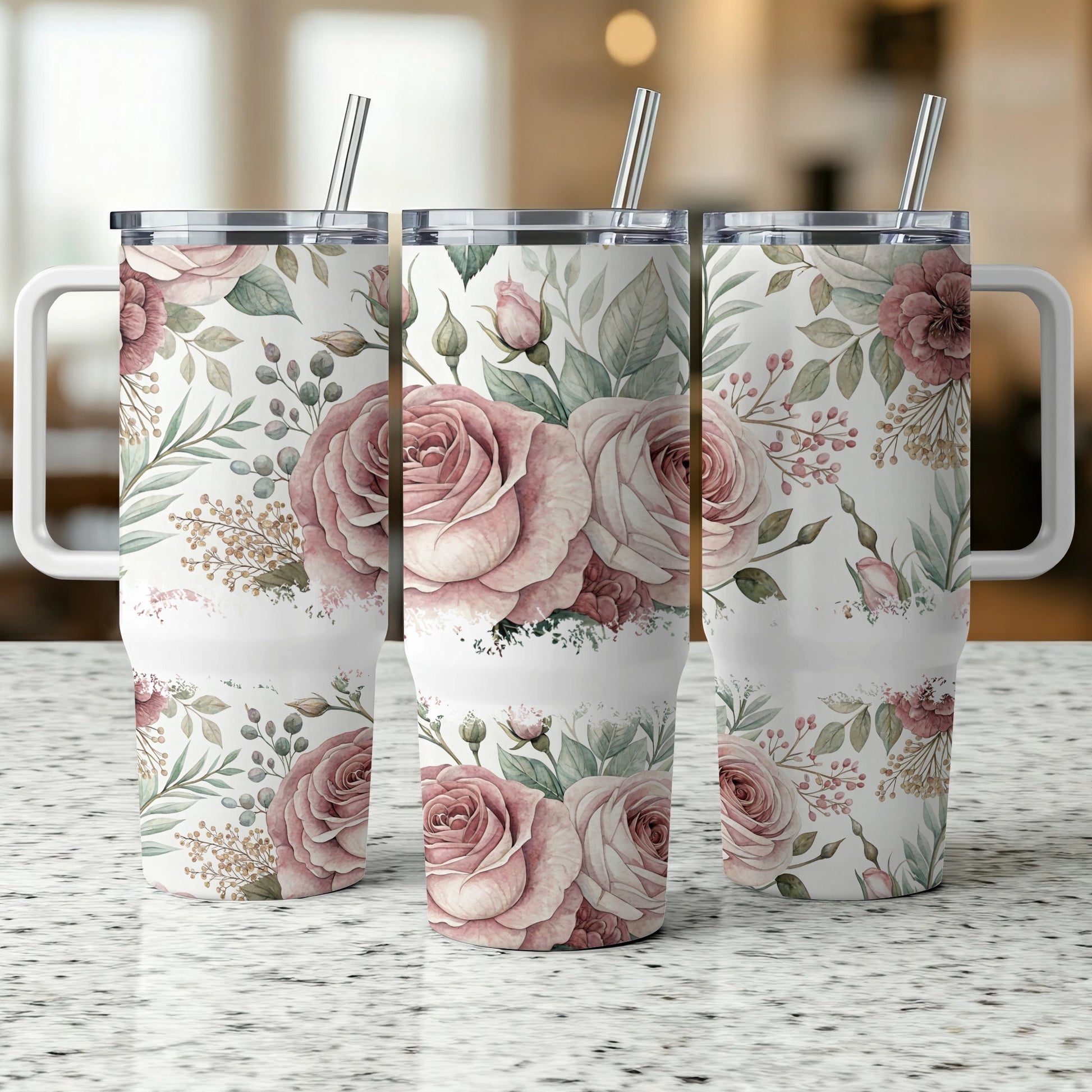 Three tumblers with a floral rose and greenery design.