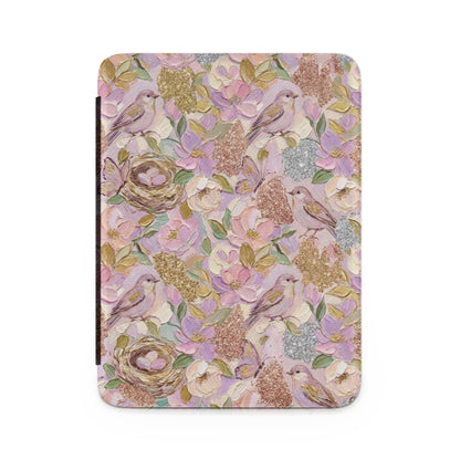 Floral pattern with birds, nests, and butterflies on a pink background.