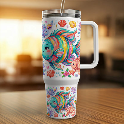 Colorful cartoon fish with seashell and coral patterns on a white travel mug.
