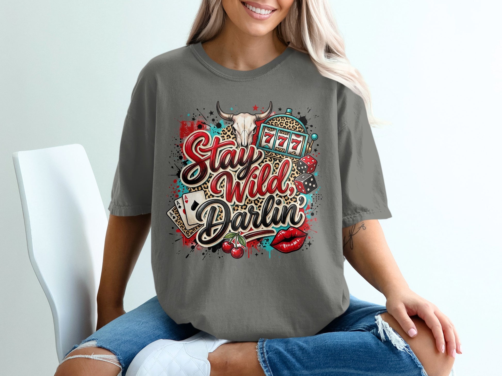 T-shirt with "Stay Wild Darlin'" text, casino and cow skull graphics.