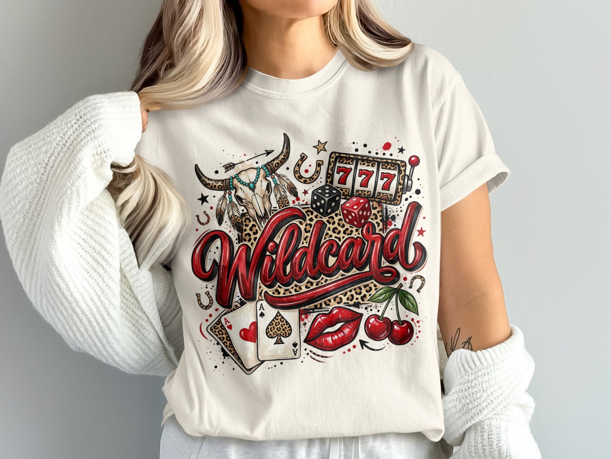 Wildcard t-shirt design with casino, skull, and playing card elements.
