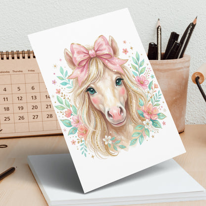 Illustration of a pastel horse with a pink bow and flowers.