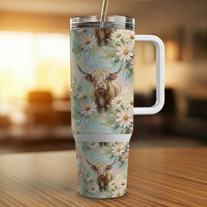 Tumbler with Highland cow and floral pattern.