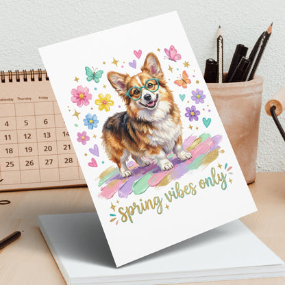 Corgi wearing glasses with "Spring vibes only" text and colorful flowers.