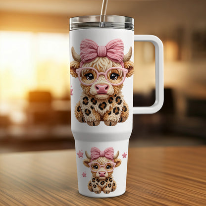 Highland cow graphic with pink bow and glasses on a tumbler.