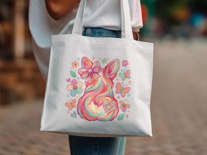 White tote bag with a colorful corgi illustration and butterflies.