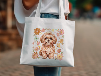 White canvas tote bag with a cute dog, flowers, and butterflies design.