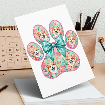 Corgi paw print card with floral accents and a teal bow.
