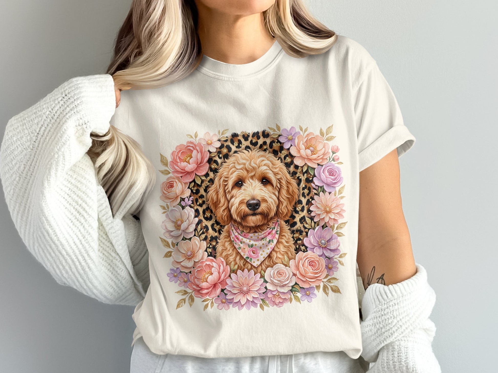 Goldendoodle in floral wreath with bandana, on a cream t-shirt.