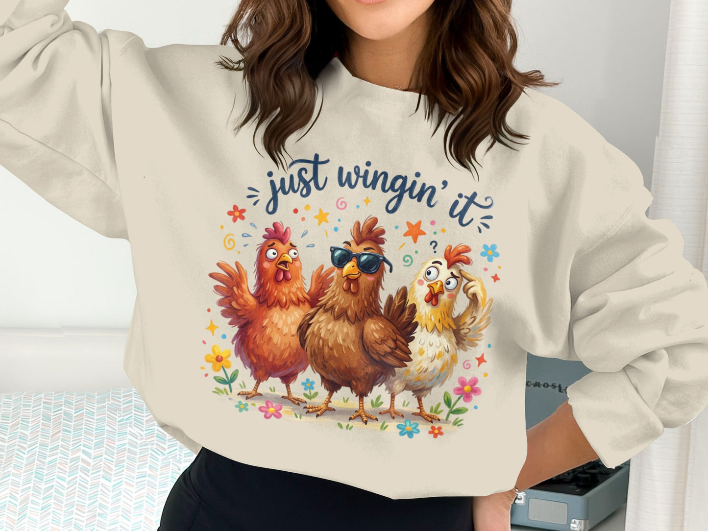 Sweatshirt with three cartoon chickens, sunglasses, and "just wingin' it" text.