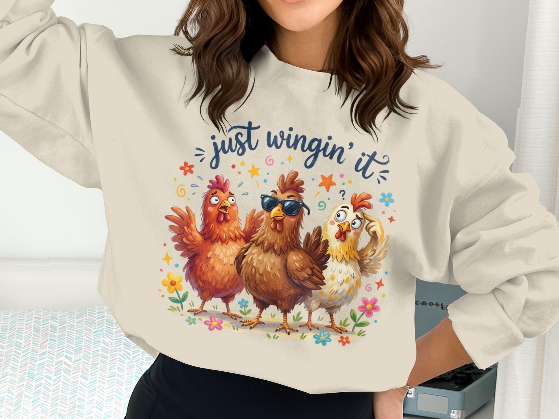 Sweatshirt with three cartoon chickens, sunglasses, and "just wingin' it" text.