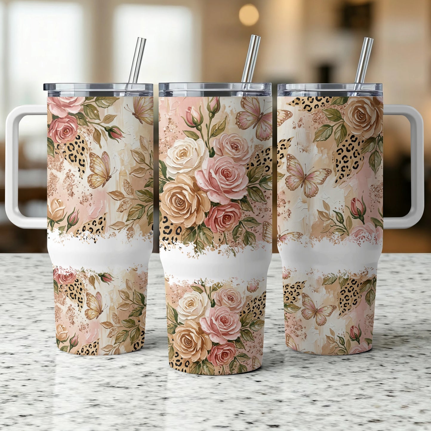 Three floral tumblers with leopard print accents and butterflies.