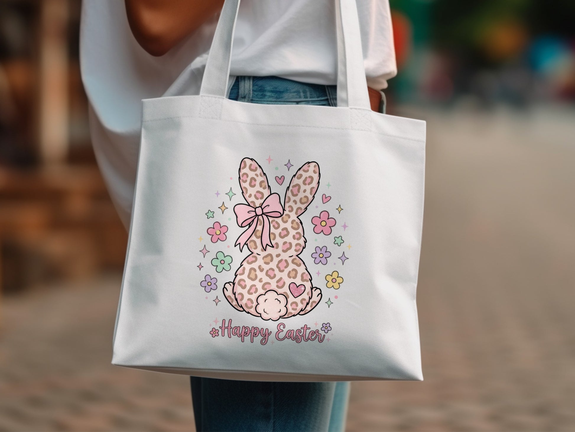White tote bag with leopard print bunny and "Happy Easter" text.