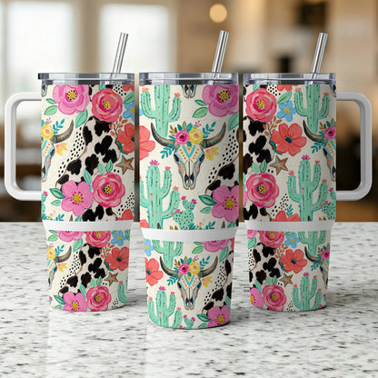 Three tumblers with cow skull, cactus, and floral print.