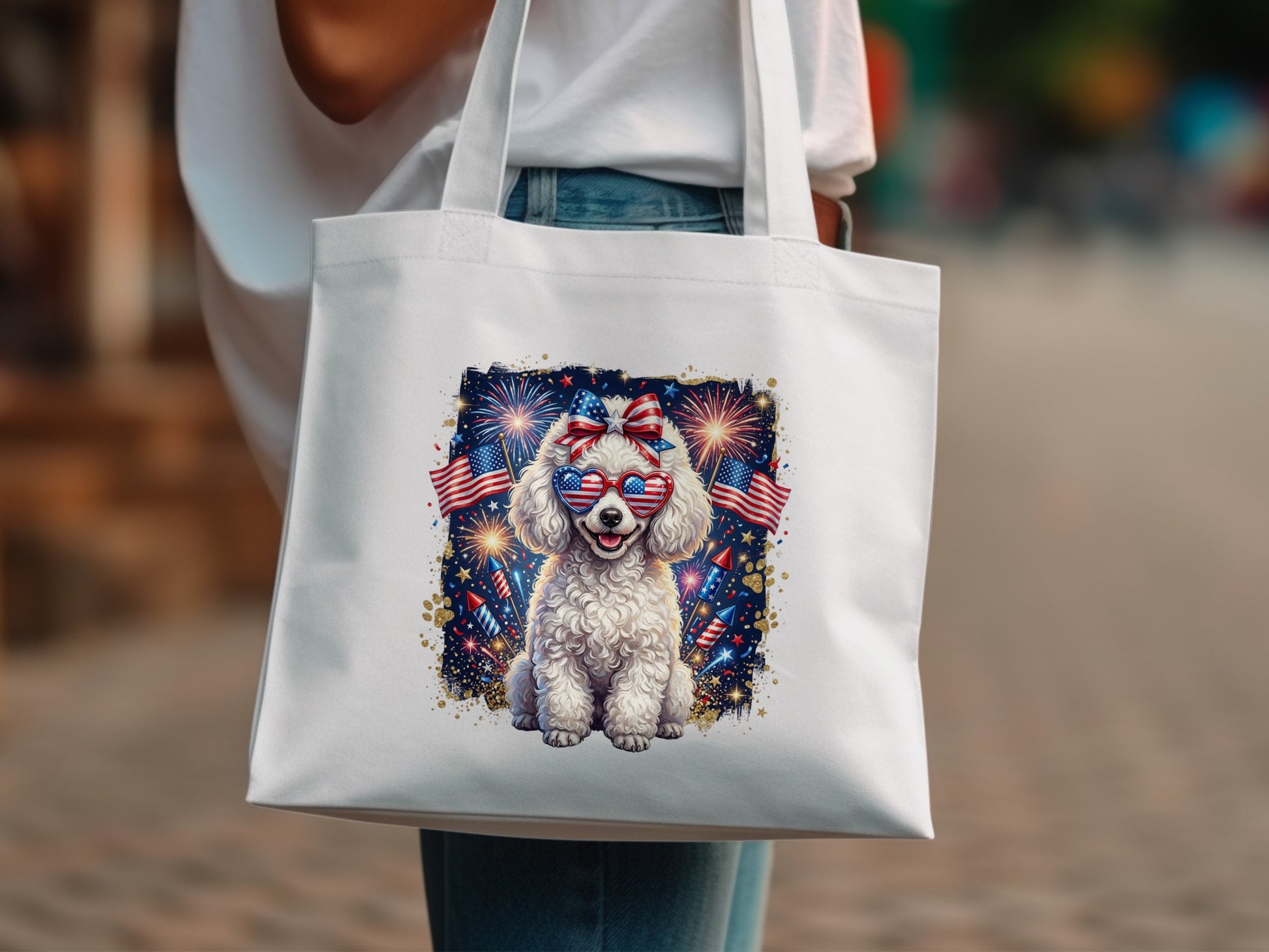 White tote bag with a fluffy white dog wearing American flag sunglasses.