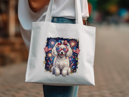 White tote bag with a fluffy white dog wearing American flag sunglasses.