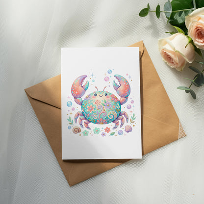 Colorful ornate crab on a greeting card with roses and eucalyptus.