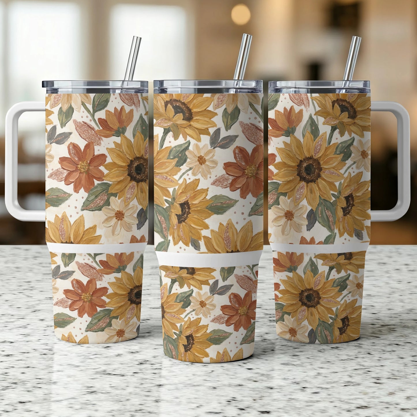 Three tumblers with floral sunflower and leaf pattern.
