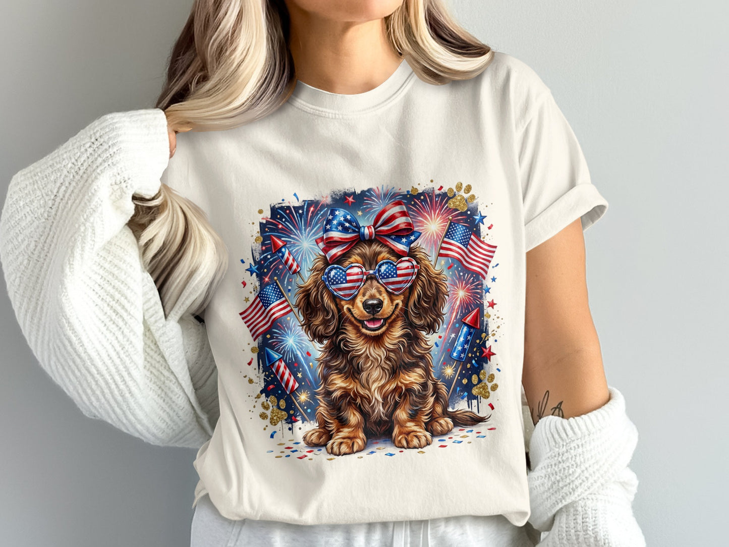 Dachshund wearing sunglasses and patriotic bow tie with fireworks.