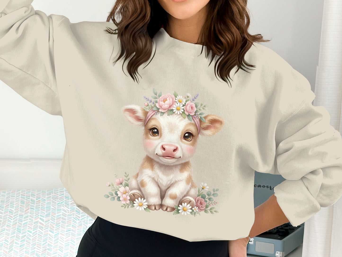 Cream crewneck sweatshirt with a cute baby cow wearing a floral crown.