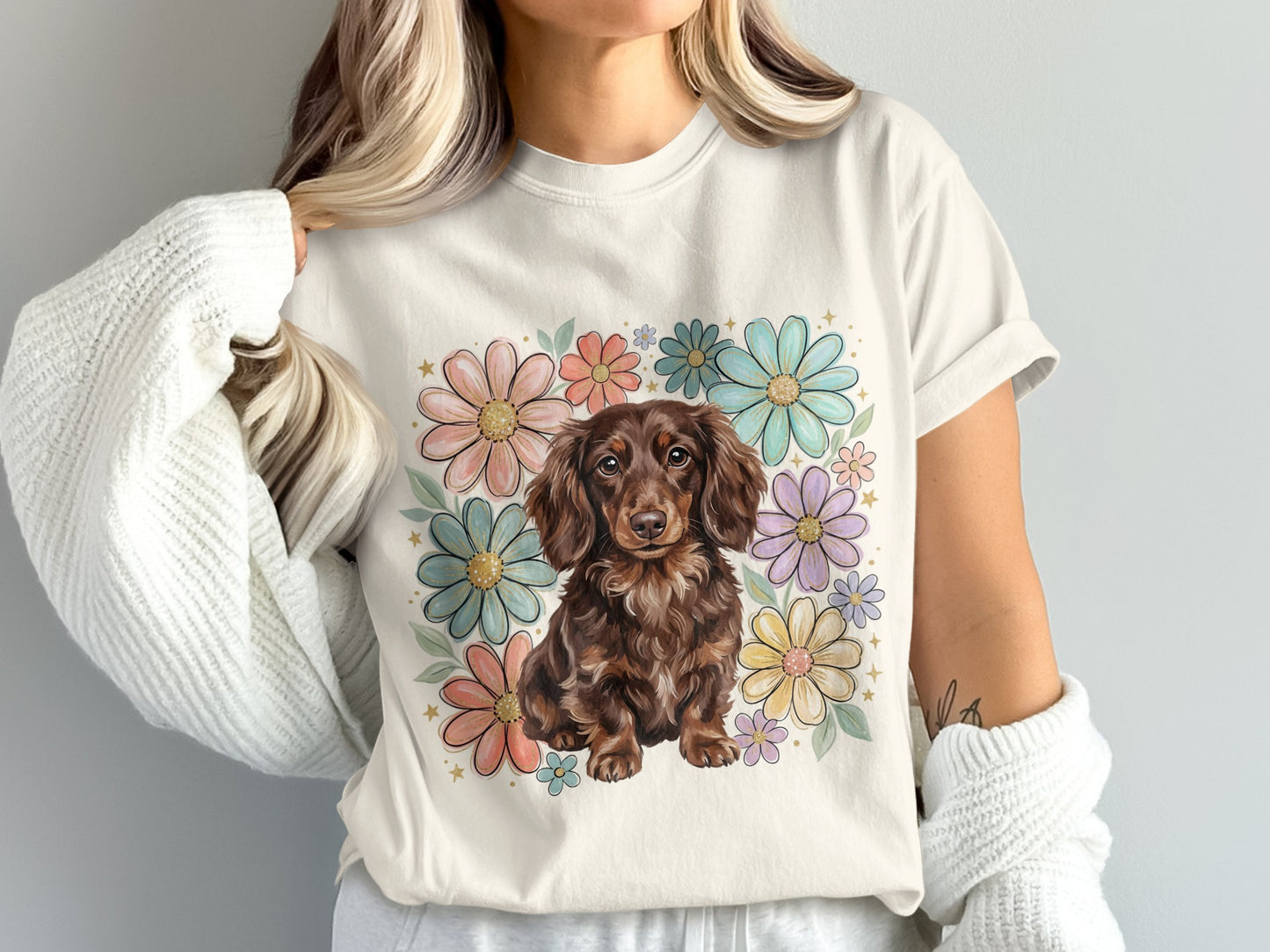 Cream t-shirt with dachshund and floral wreath graphic.