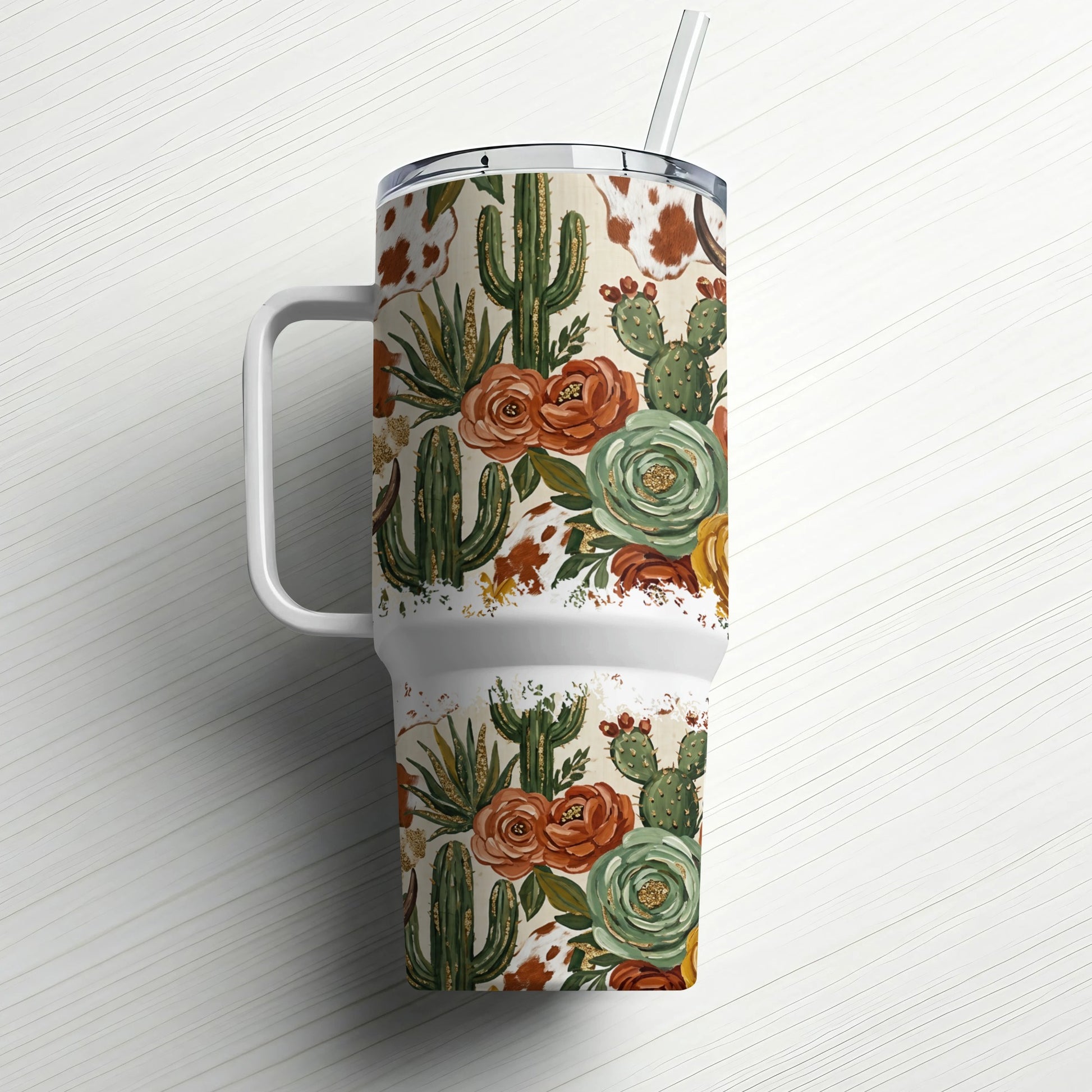 30 oz tumbler with desert floral and cowhide pattern.
