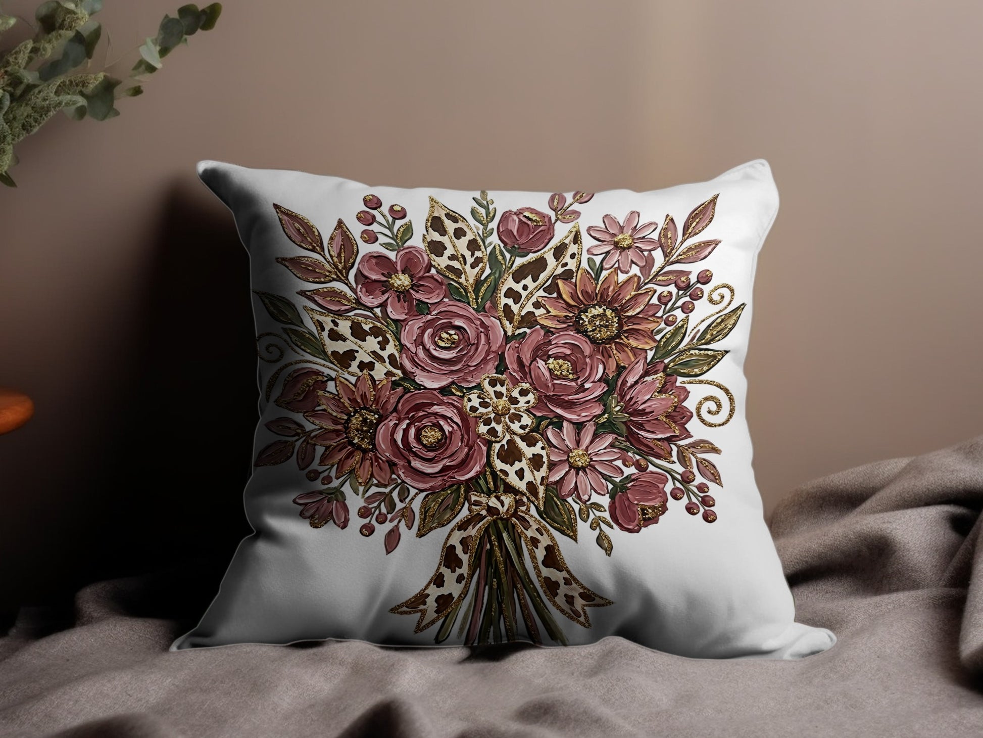 Throw pillow with a pink floral bouquet and leopard print ribbon accent.