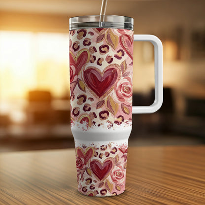 30oz tumbler with hearts and roses pattern, white handle, and straw.