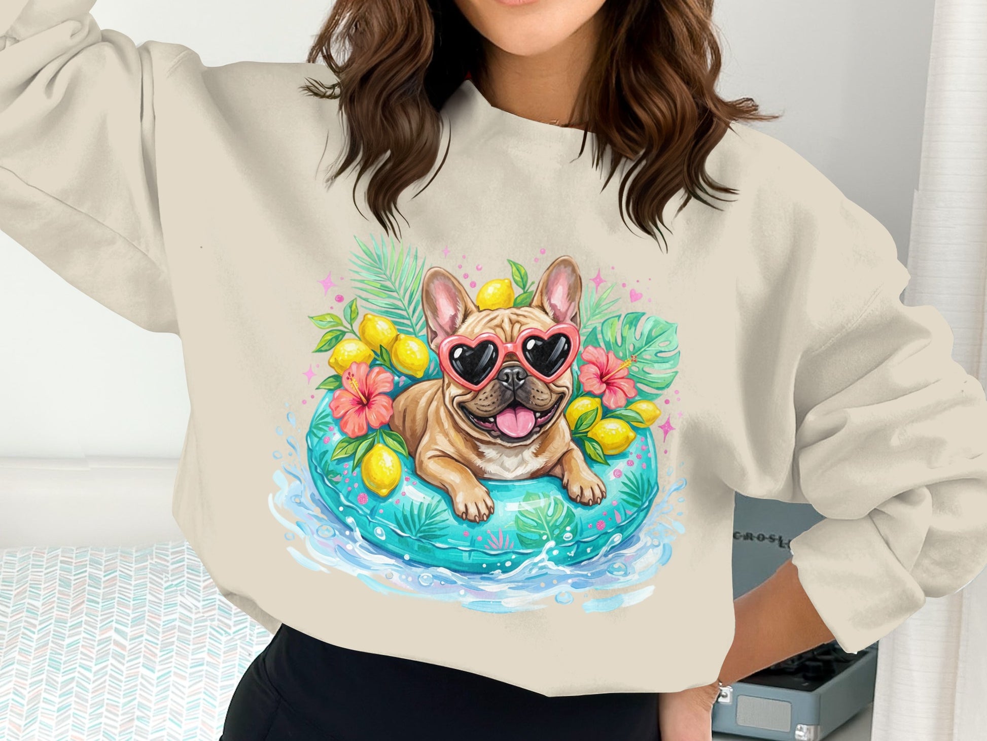 French bulldog wearing heart sunglasses floats on inflatable pool ring with tropical flowers.