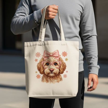Cream tote bag featuring a cartoon dog wearing glasses and a bow.