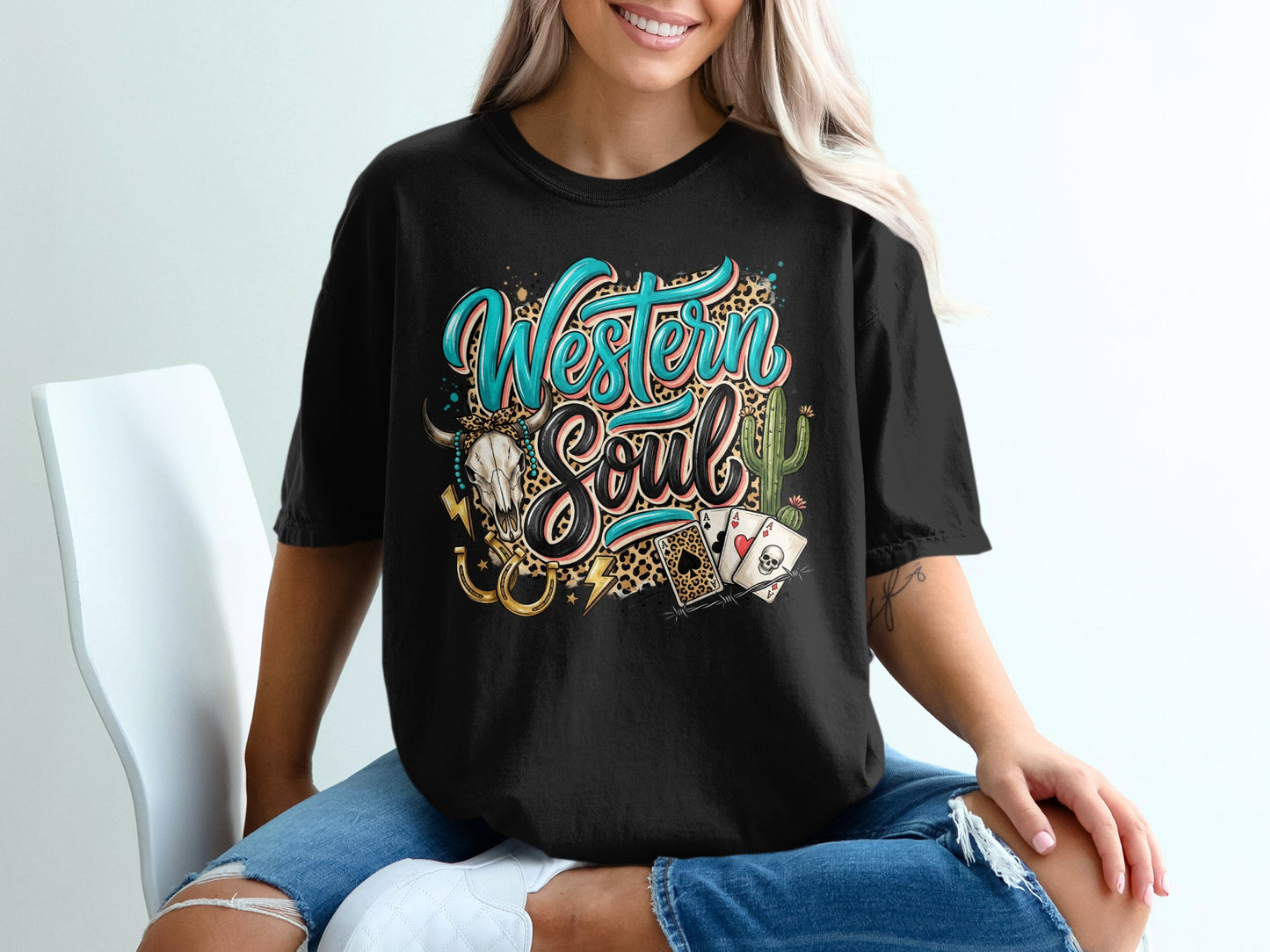 Black t-shirt with "Western Soul" text, leopard print, skull, and playing cards.