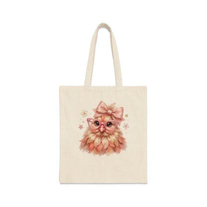 Cream tote bag with a cute watercolor illustration of a fluffy bird wearing pink glasses and a bow.