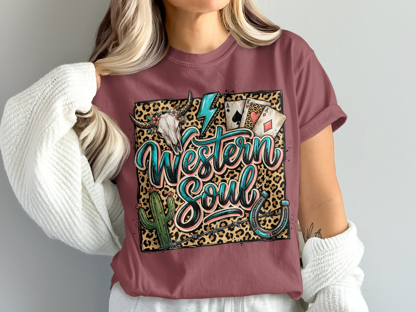 Burgundy t-shirt with "Western Soul" graphic featuring a skull, cactus, horseshoe, and cards.
